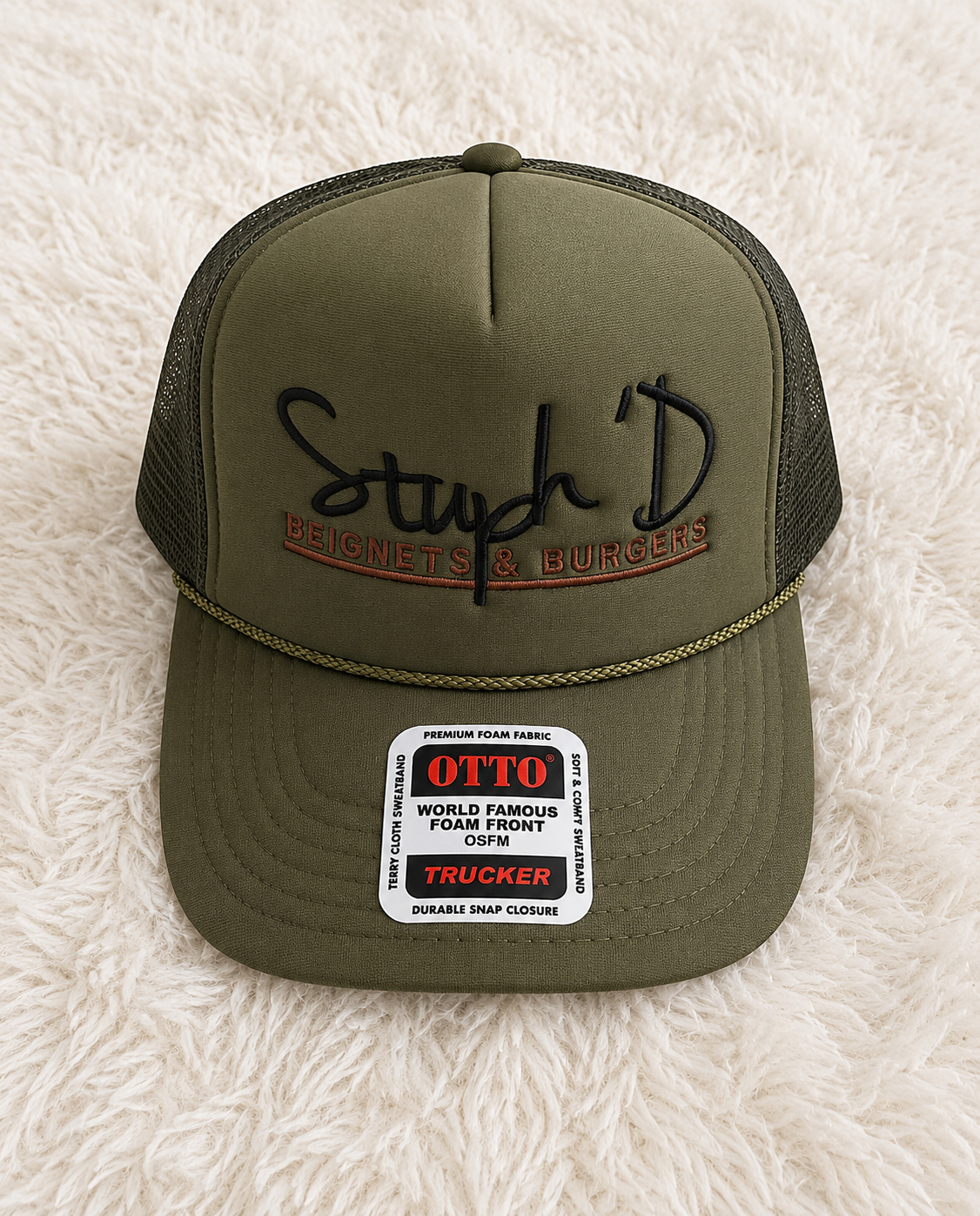 Stuph 'D Beignets & Burgers olive green Otto trucker hat with black embroidery and gold rope
